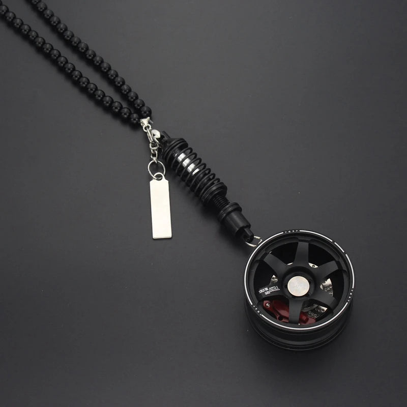 Racing Style Wheel Pendant with Shock Absorber – Auto Mirror Hanging Ornament