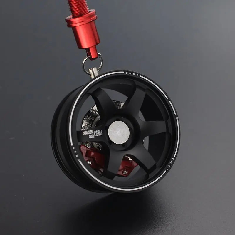 Racing Style Wheel Pendant with Shock Absorber – Auto Mirror Hanging Ornament